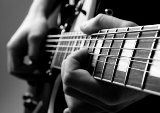 Responding to an ad: guitarist wanted